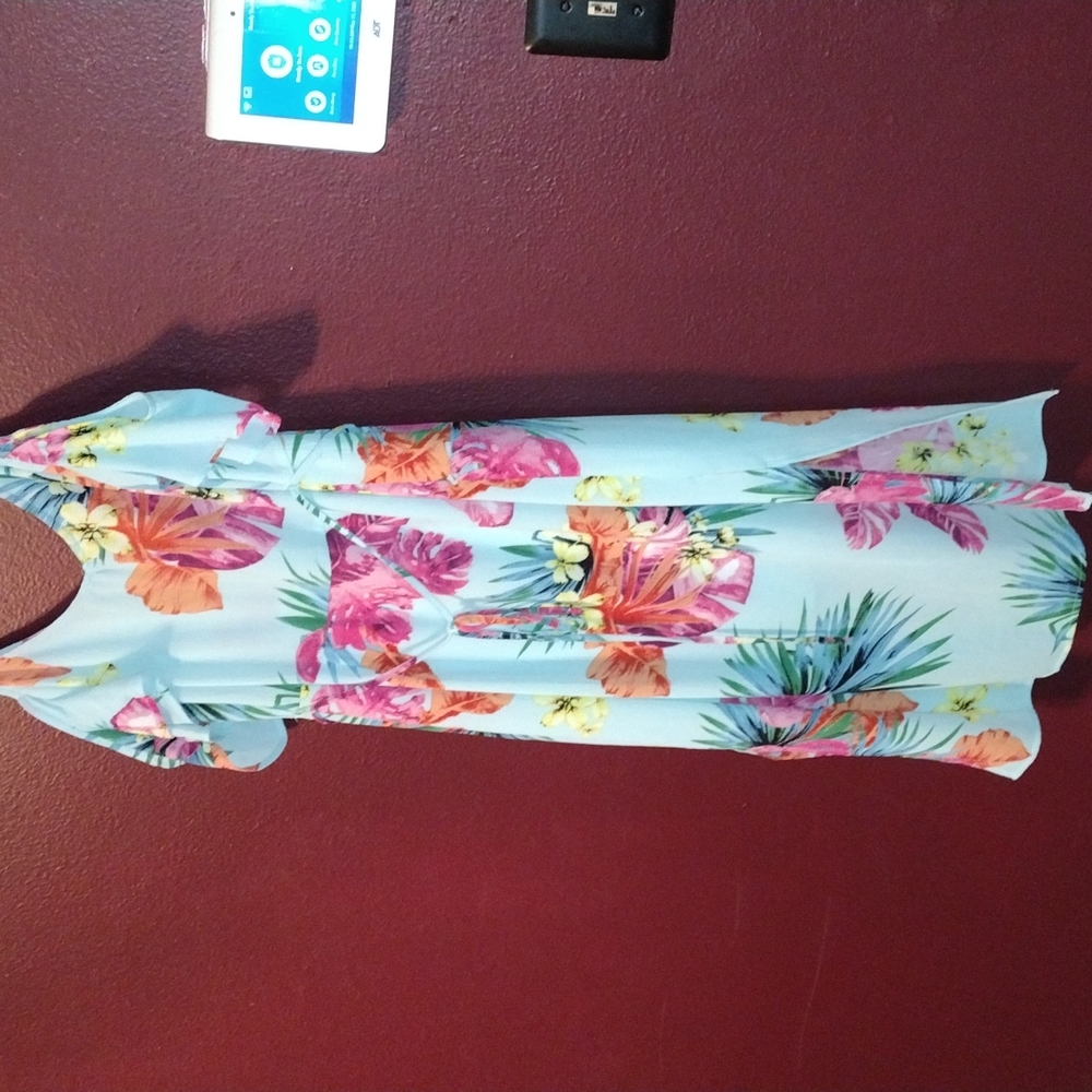 Cute Summer Floral print dress side slits, color is an aqua blue